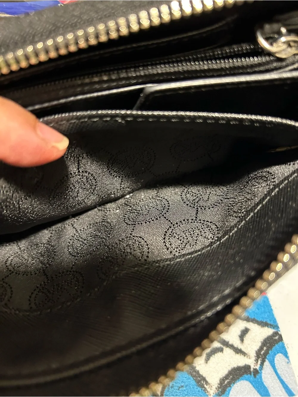 Michael Kors Black Pebbled Leather Zip-Around Wallet with Logo Plaque